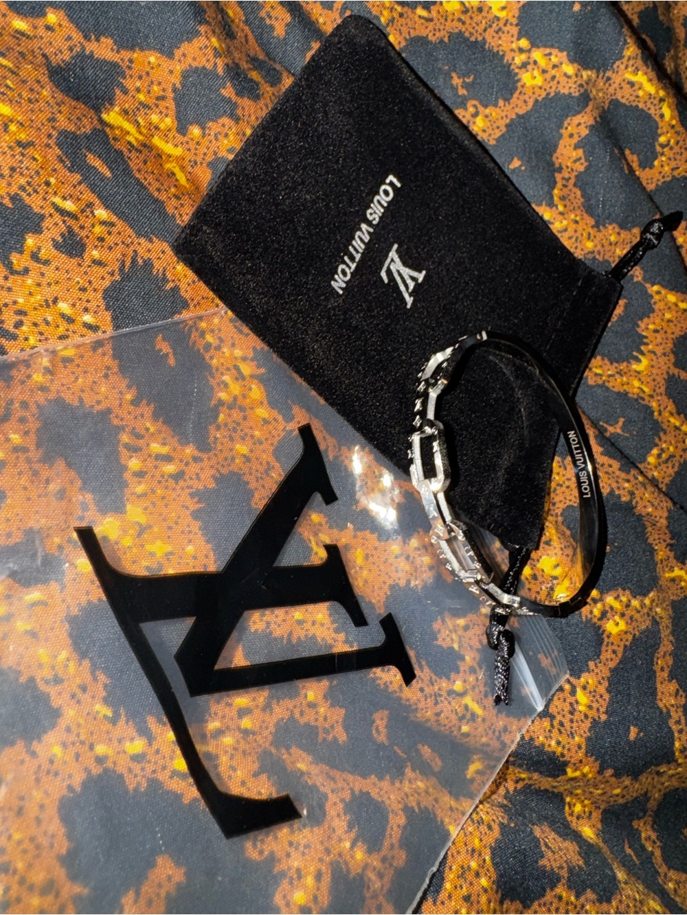 Louis Vuitton Silver Logo Cuff Bracelet - Picture 2 of 8